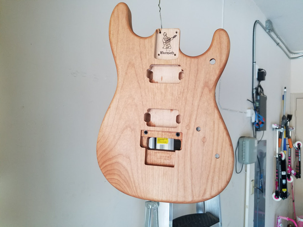 Applying Pure Tung Oil To A Guitar 